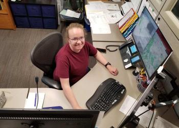 Liz Bauer at the dispatch desk