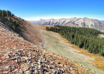 A landscape photo of Wilderness with trees and mountains