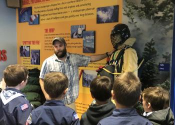 Educator sharing fire resources with kids