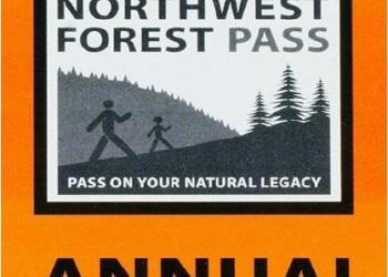 Orange sign with Northwest Forest Pass Annual on it