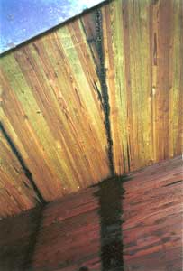 photo of rubber asphalt dripping from bridge