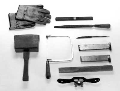 Photo of tools needed for hanging an ax.