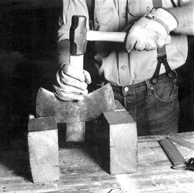 Photo of blocking up the ax head upside down.